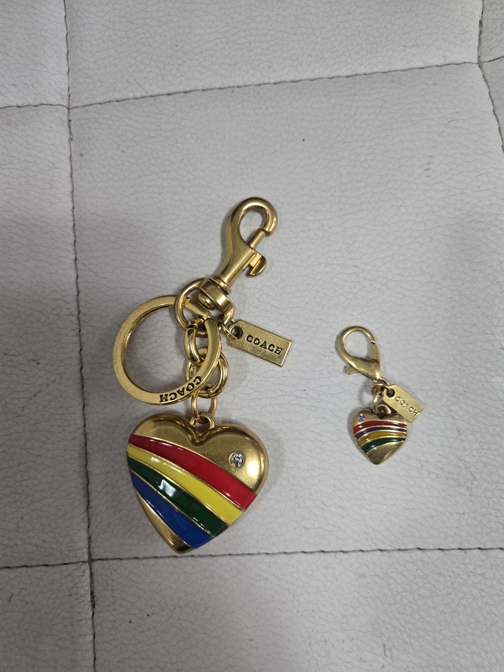 Coach 2-Piece Gold Rainbow Enamel Striped Heart Bag Charm & Keychain Set